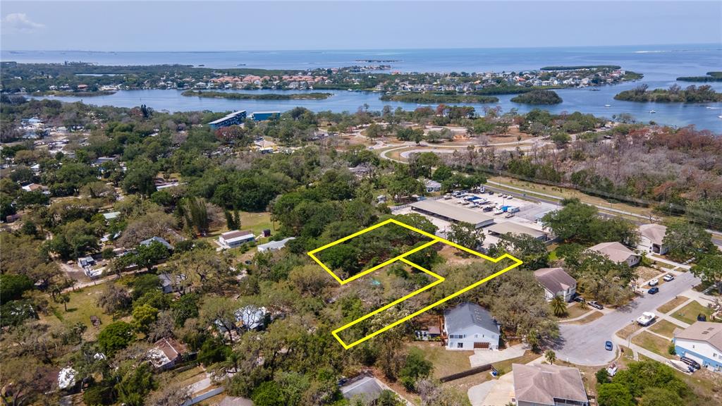 1810 Cemetery Road Holiday, FL 34691 - Photo 5 of 15 an aerial view of a tennis ground and a city view