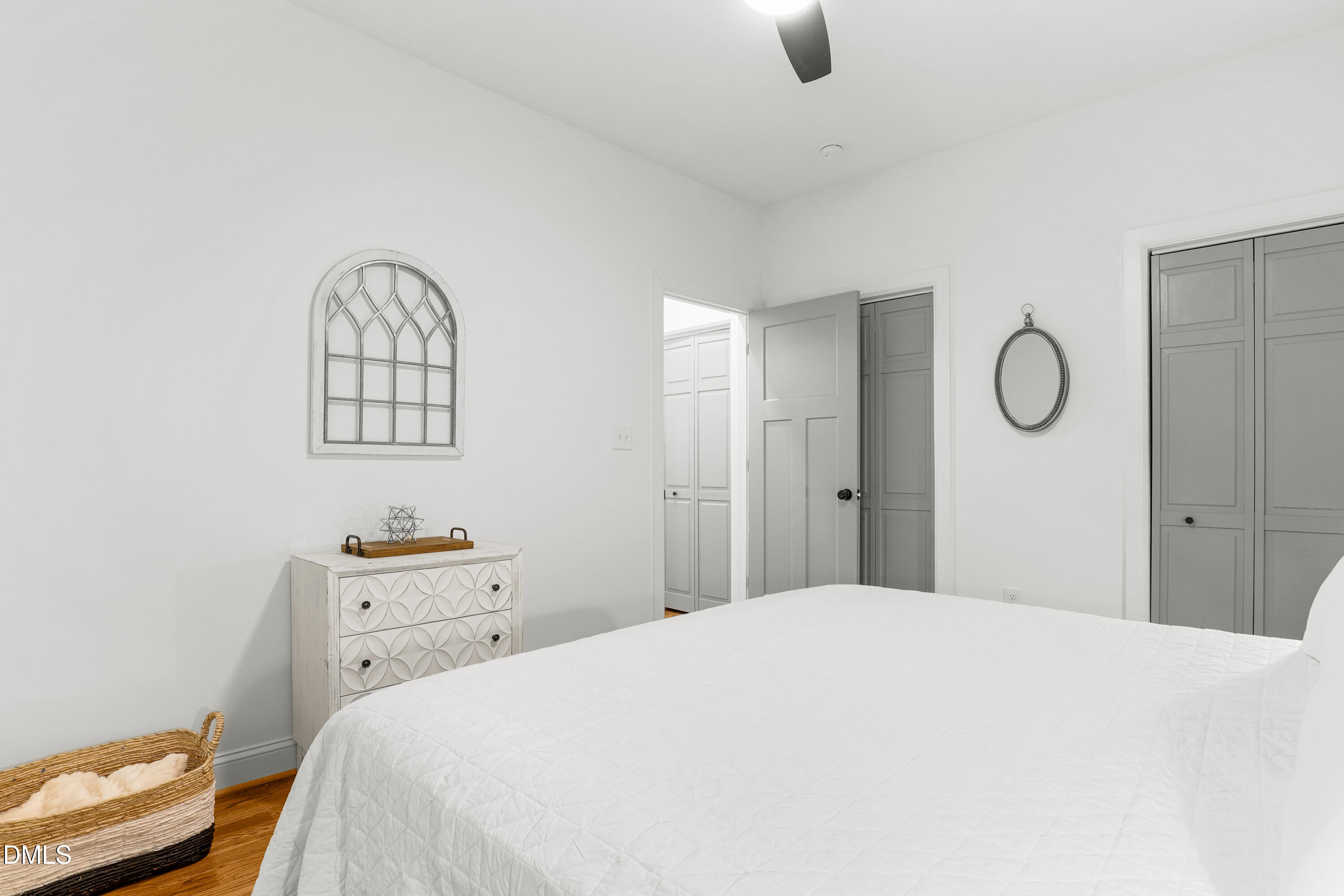 1217 Rosedale Avenue, Unit B Durham, NC 27707 - Photo 13 of 24 a bedroom with a bed and cabinets
