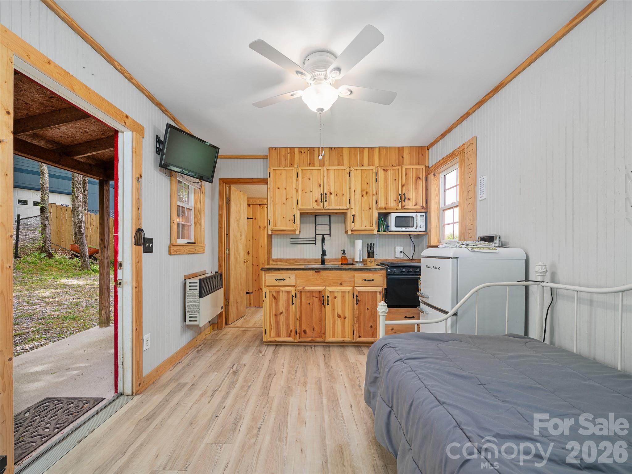 228 Continental Divide Road Spruce Pine, NC 28777 - Photo 39 of 48 a large bedroom with a large bed and a large window