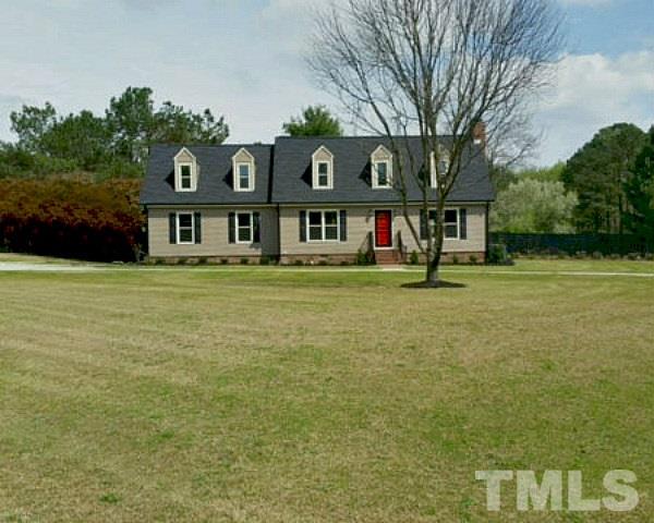 1608 Spennymore Road Raleigh, NC 27603 - Photo 1 of 25 a front view of building with yard and trees