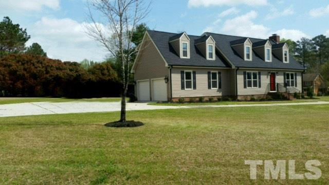 1608 Spennymore Road Raleigh, NC 27603 - Photo 2 of 25 a front view of a house with a yard