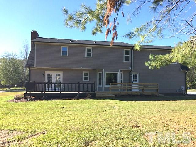 1608 Spennymore Road Raleigh, NC 27603 - Photo 5 of 25 a view of a house with a yard