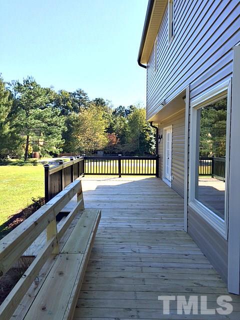 1608 Spennymore Road Raleigh, NC 27603 - Photo 6 of 25 a view of a house with a balcony