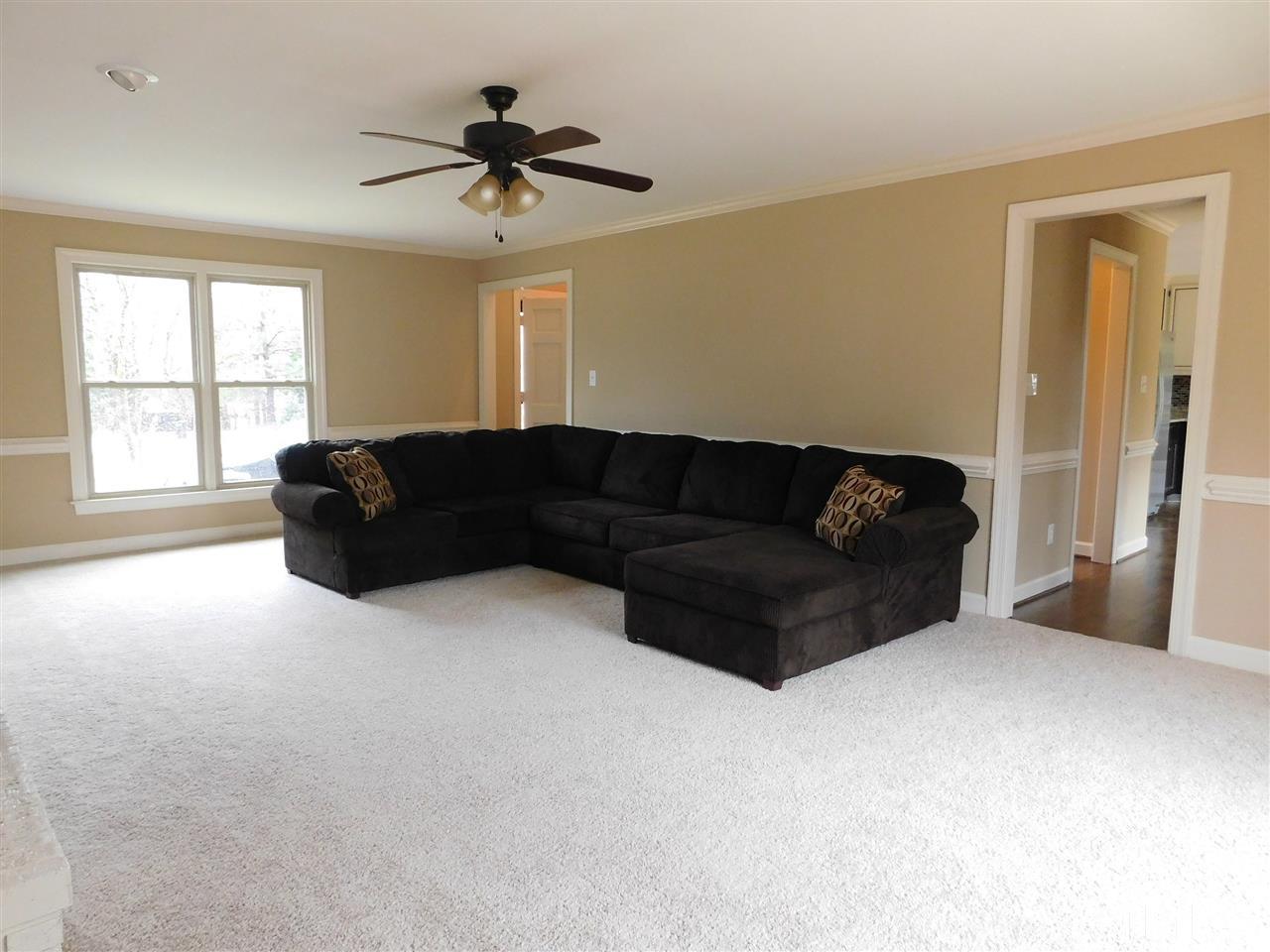1608 Spennymore Road Raleigh, NC 27603 - Photo 8 of 25 a living room with furniture