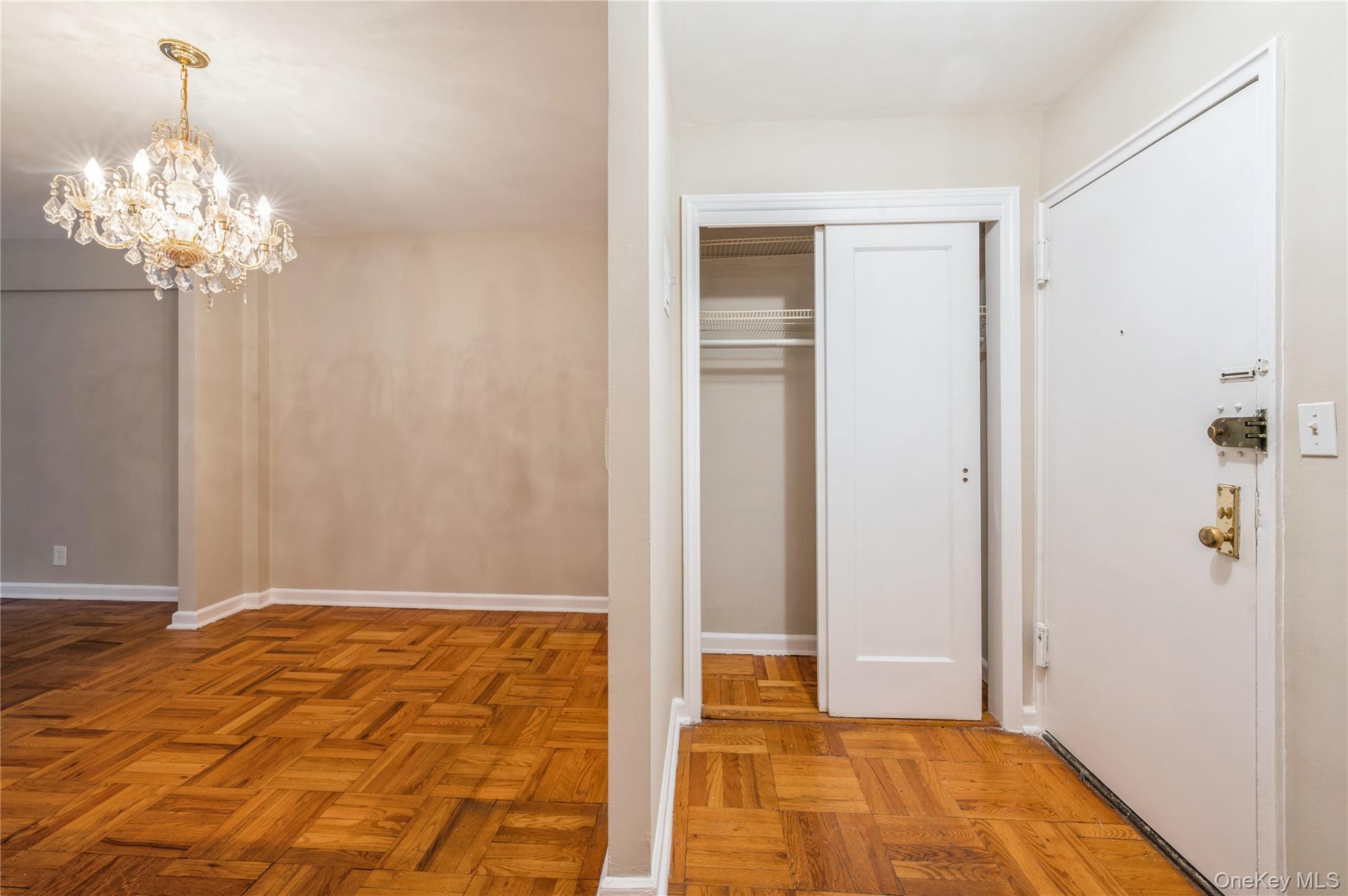 50 White Oak Street, Unit 1E New Rochelle, NY 10801 - Photo 19 of 19 a view of a chandelier in a room