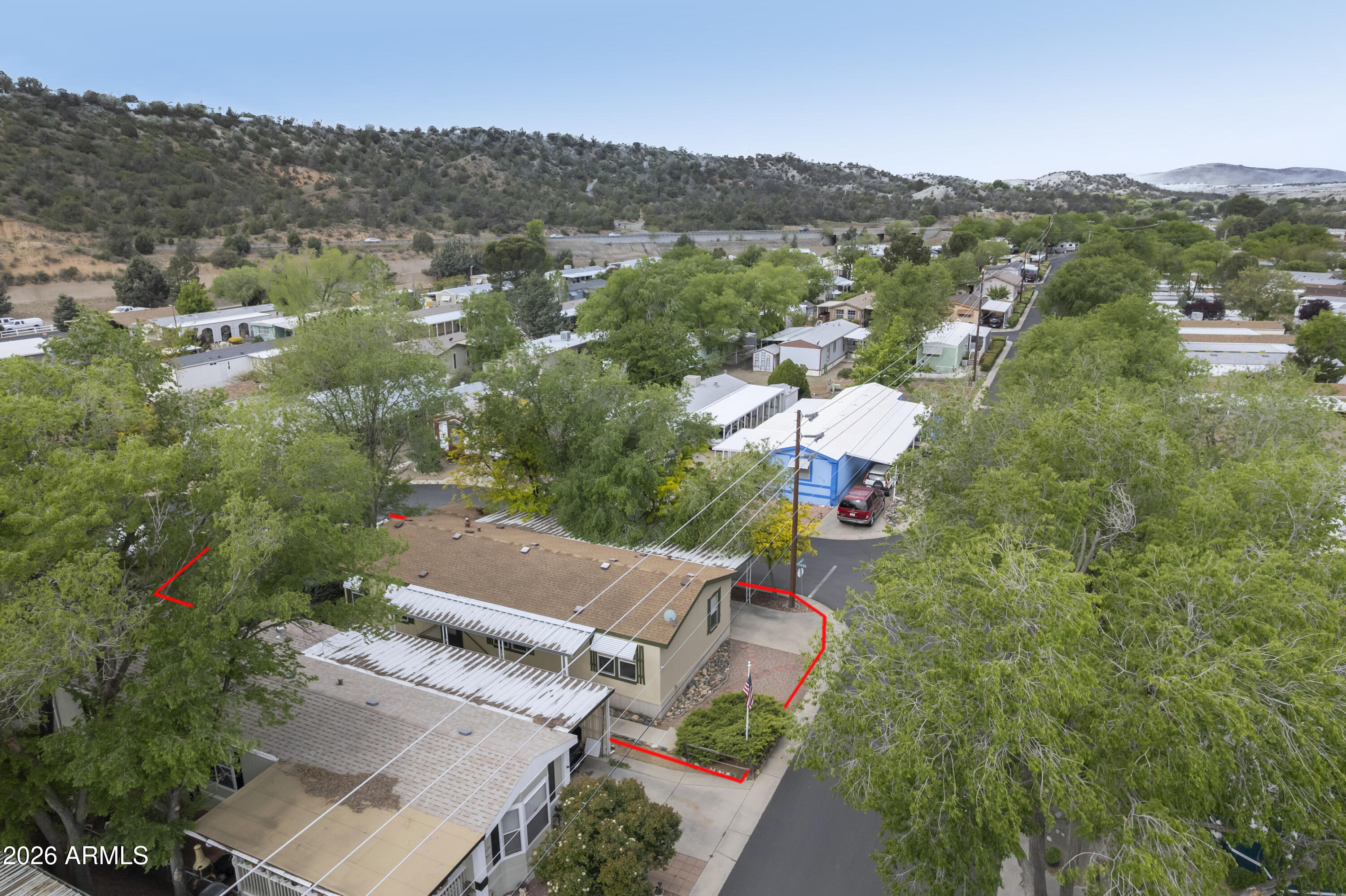 11250 East State Rte 69, Unit 1125 Dewey, AZ 86327 - Photo 1 of 45 an aerial view of a town with couple of houses