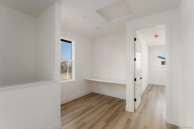 a view of room with hardwood floor