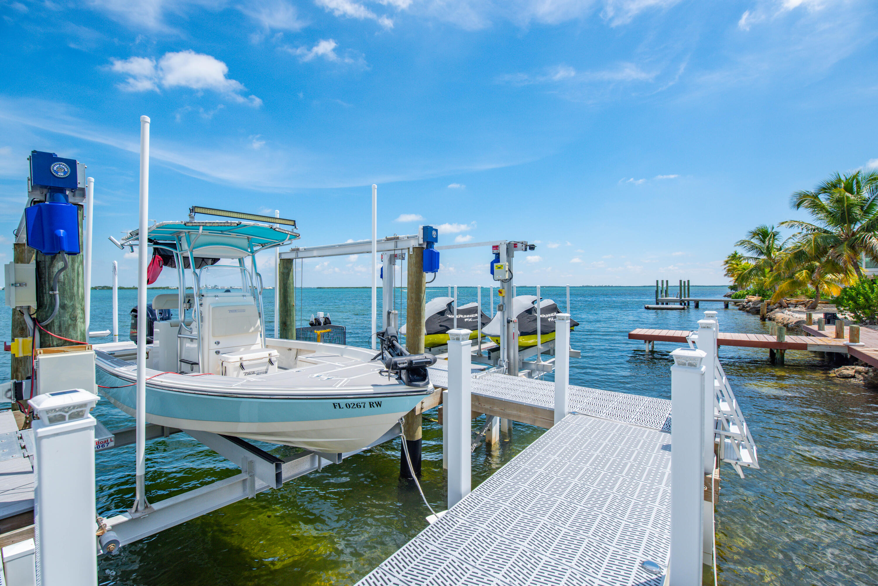 747 La Fitte Road Summerland Key, FL 33042 - Photo 66 of 103 a outdoor view with a sitting space and large trees