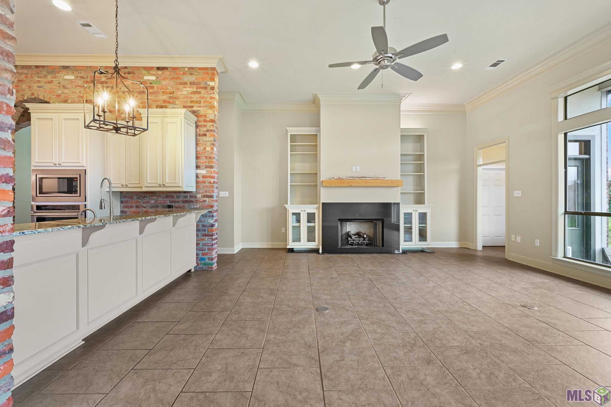 8926 Foxgate Drive St. George, LA 70809 - Photo 3 of 16 GAS LOG FIREPLACE