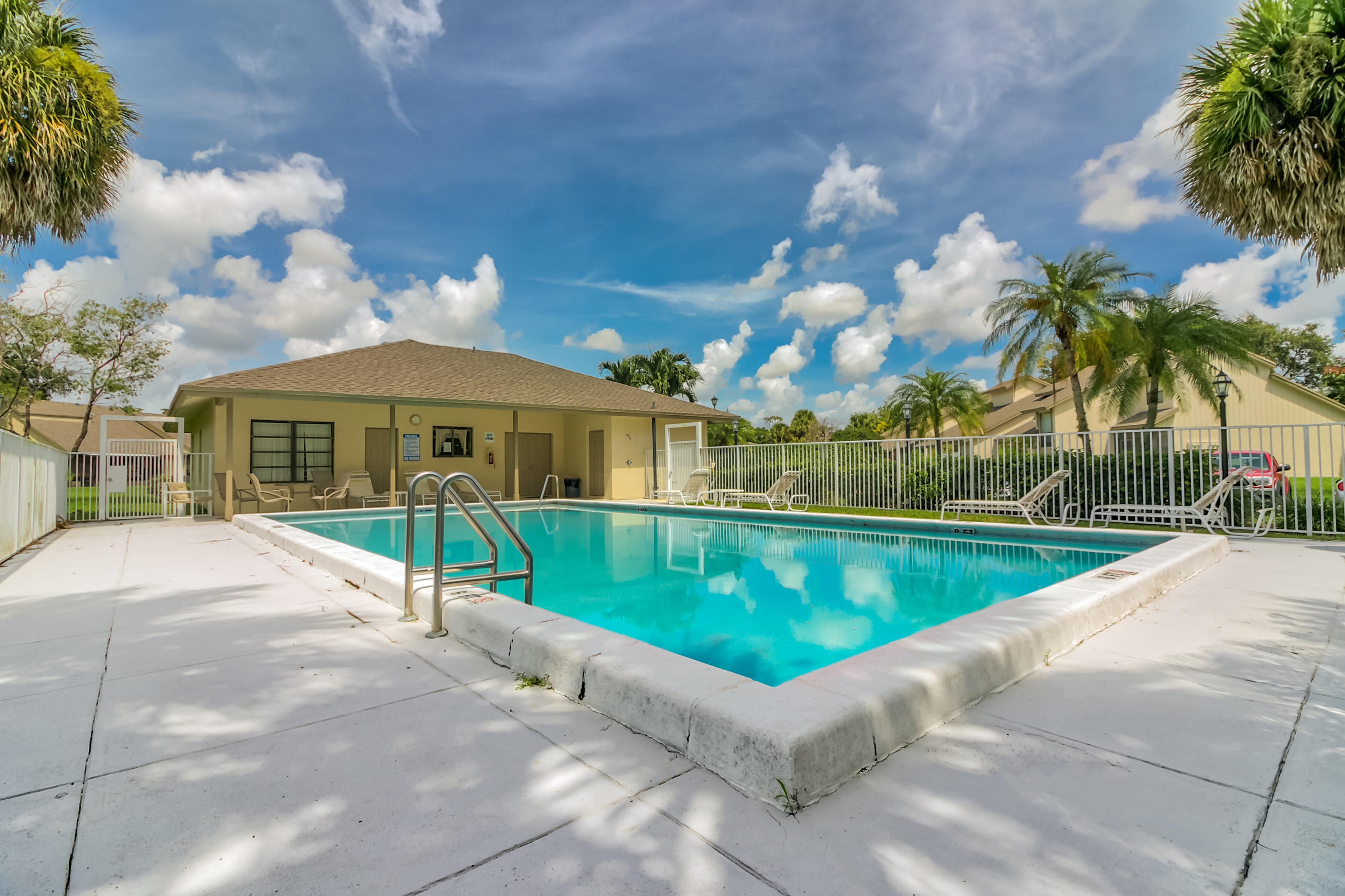 9311 Ketay Circle, Unit 4 Boca Raton, FL 33428 - Photo 18 of 24 Pool and clubhouse