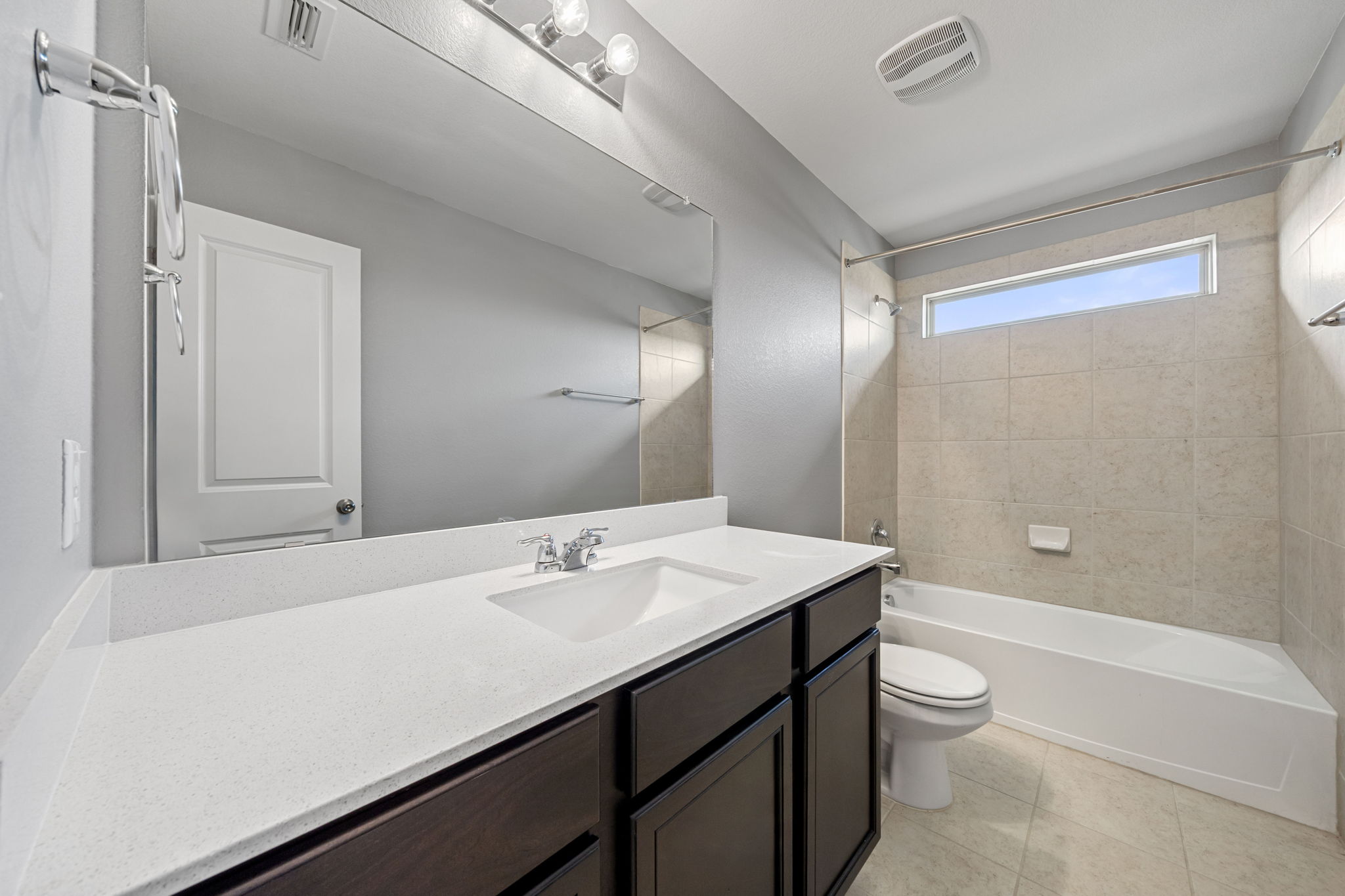 436 Spinnaker Loop Kyle, TX 78640 - Photo 8 of 14 a bathroom with a sink a toilet and shower