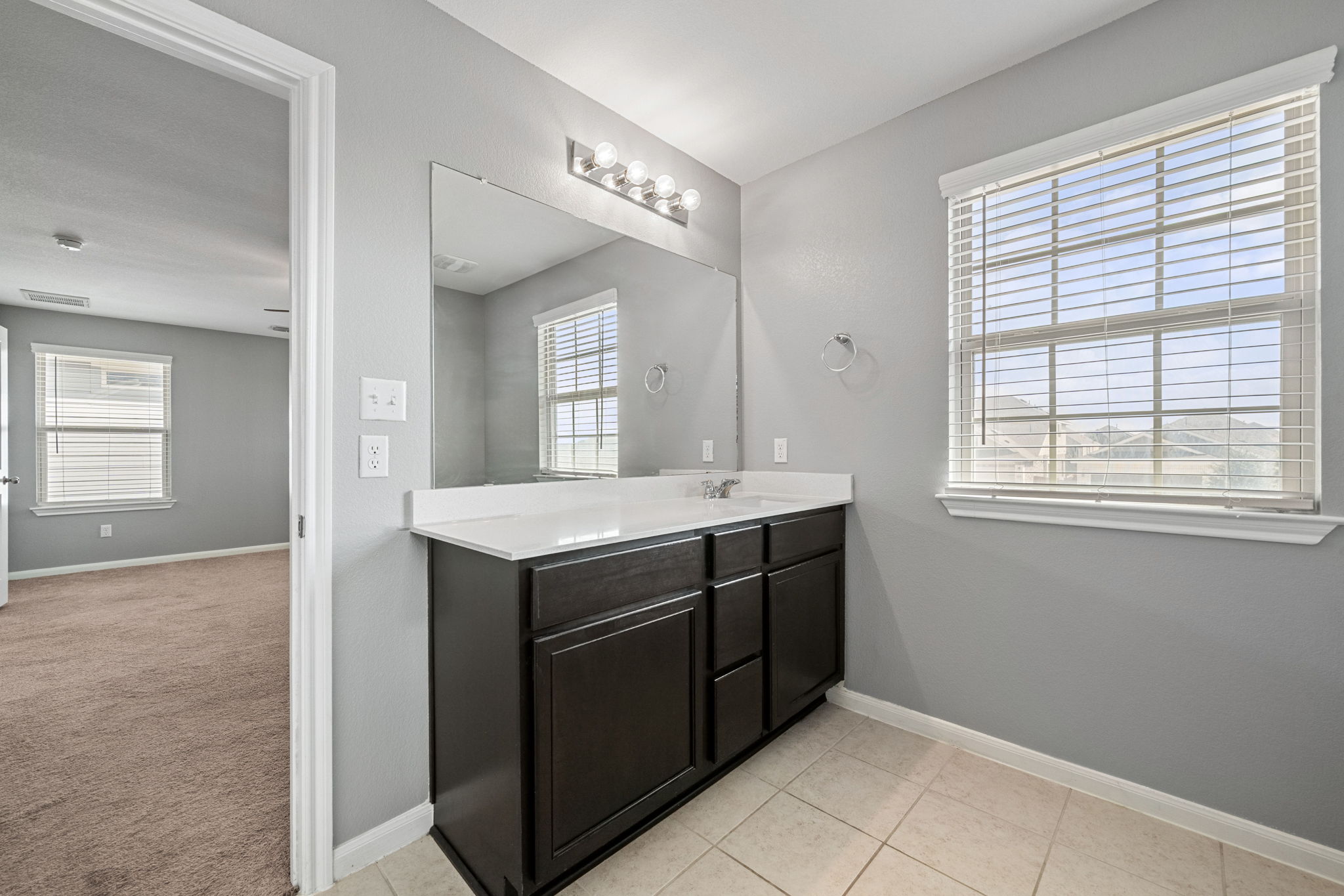 436 Spinnaker Loop Kyle, TX 78640 - Photo 10 of 14 a kitchen with a stove and a sink