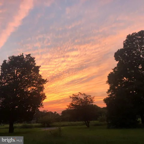 a view of mountain with lake view
