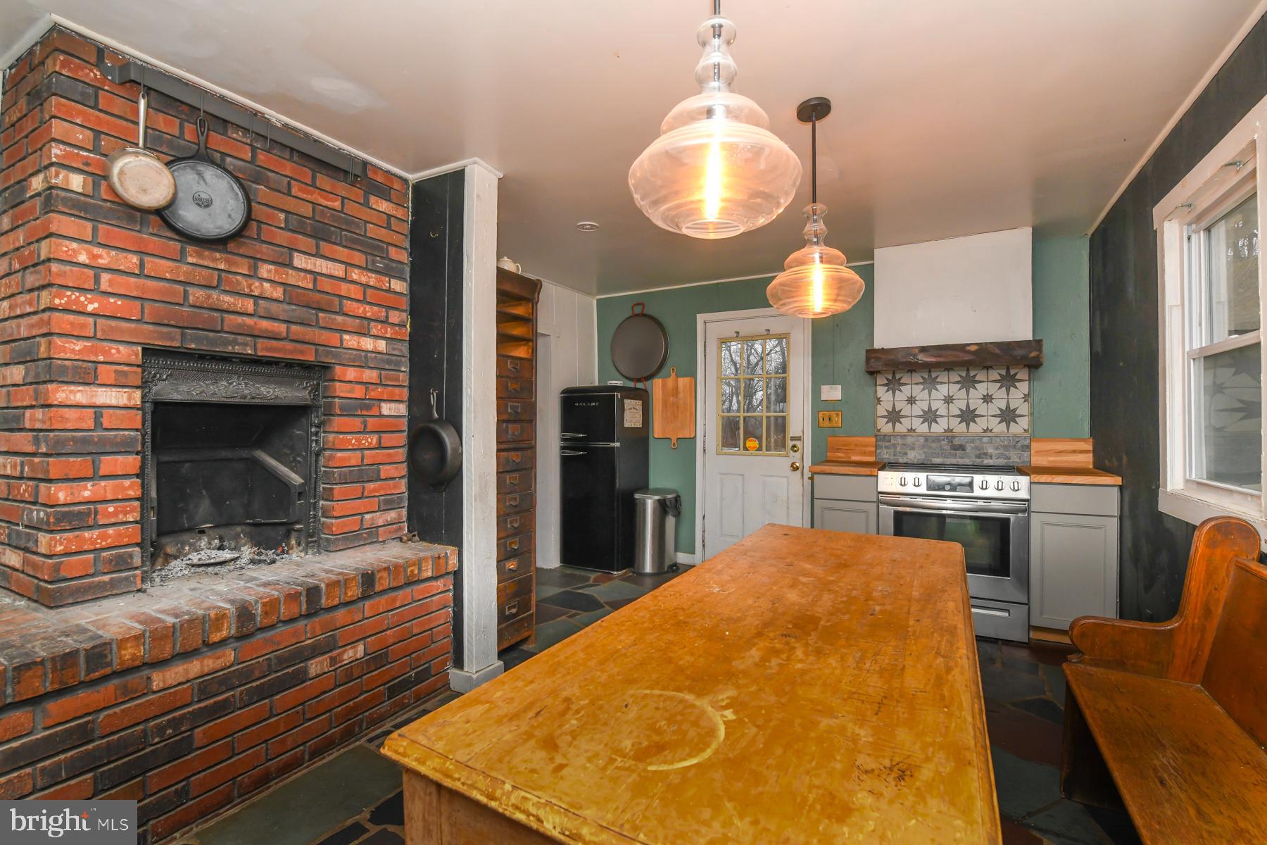 2270 Harding Highway Newfield, NJ 08344 - Photo 8 of 13 a kitchen with stainless steel appliances kitchen island granite countertop a stove and a sink