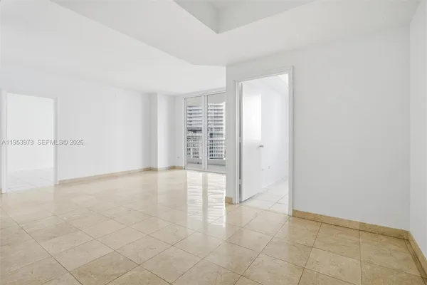 an empty room with windows