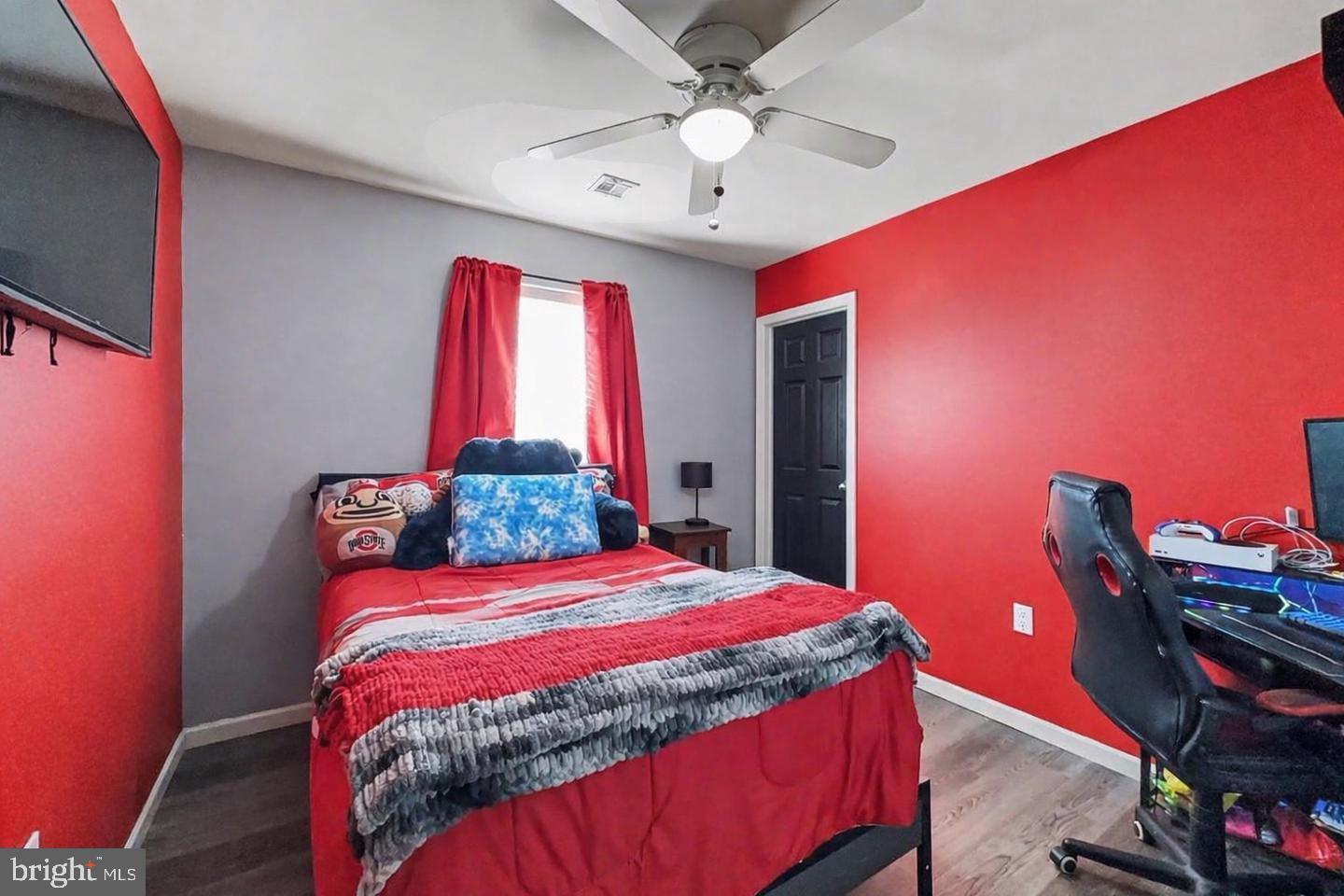 10 Coriander Lane Manchester, PA 17345 - Photo 22 of 25 a bedroom with a bed and a chandelier