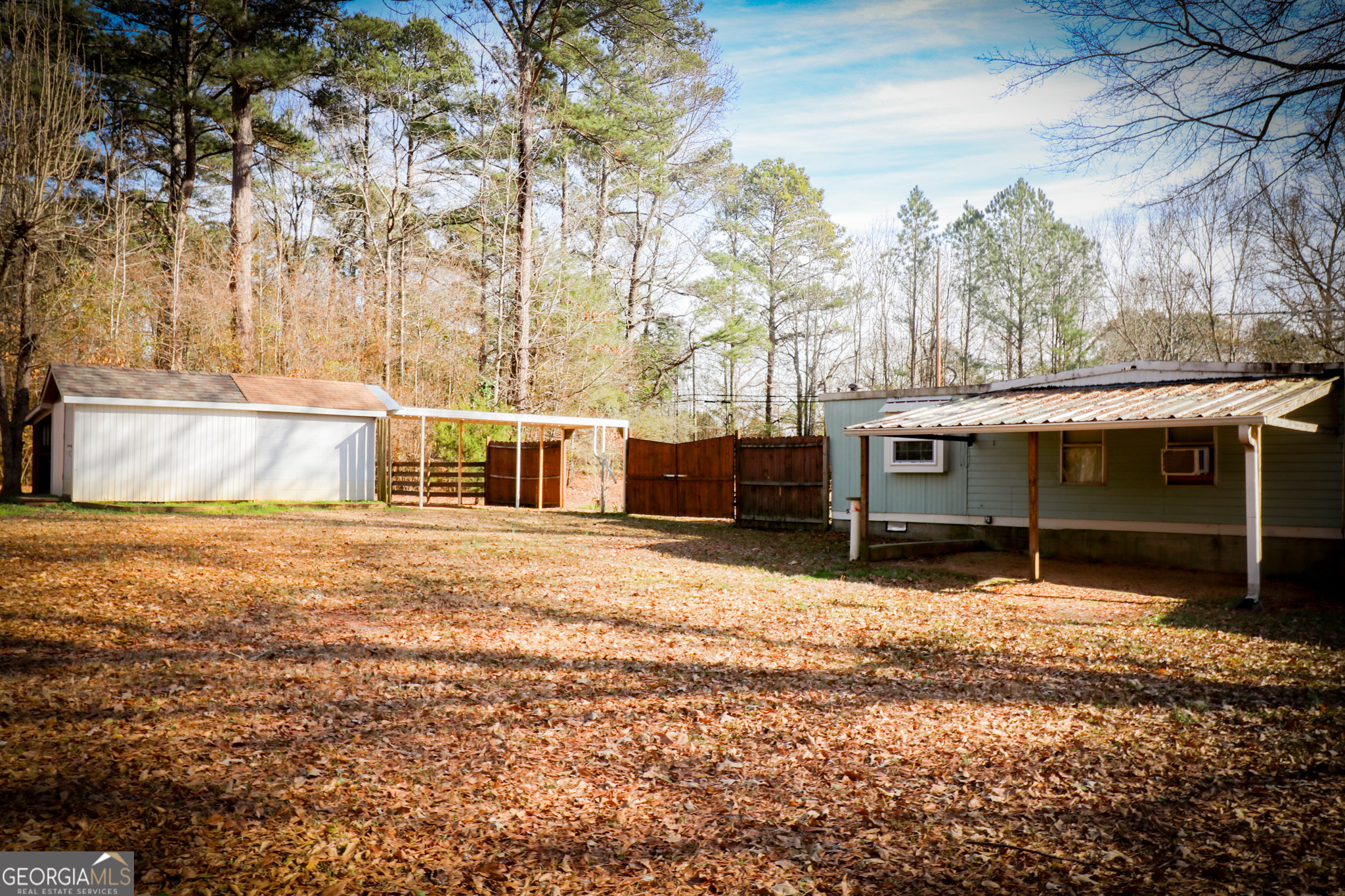 2447 Williamson Road Williamson, GA 30292 - Photo 40 of 95 a view of a house with a yard