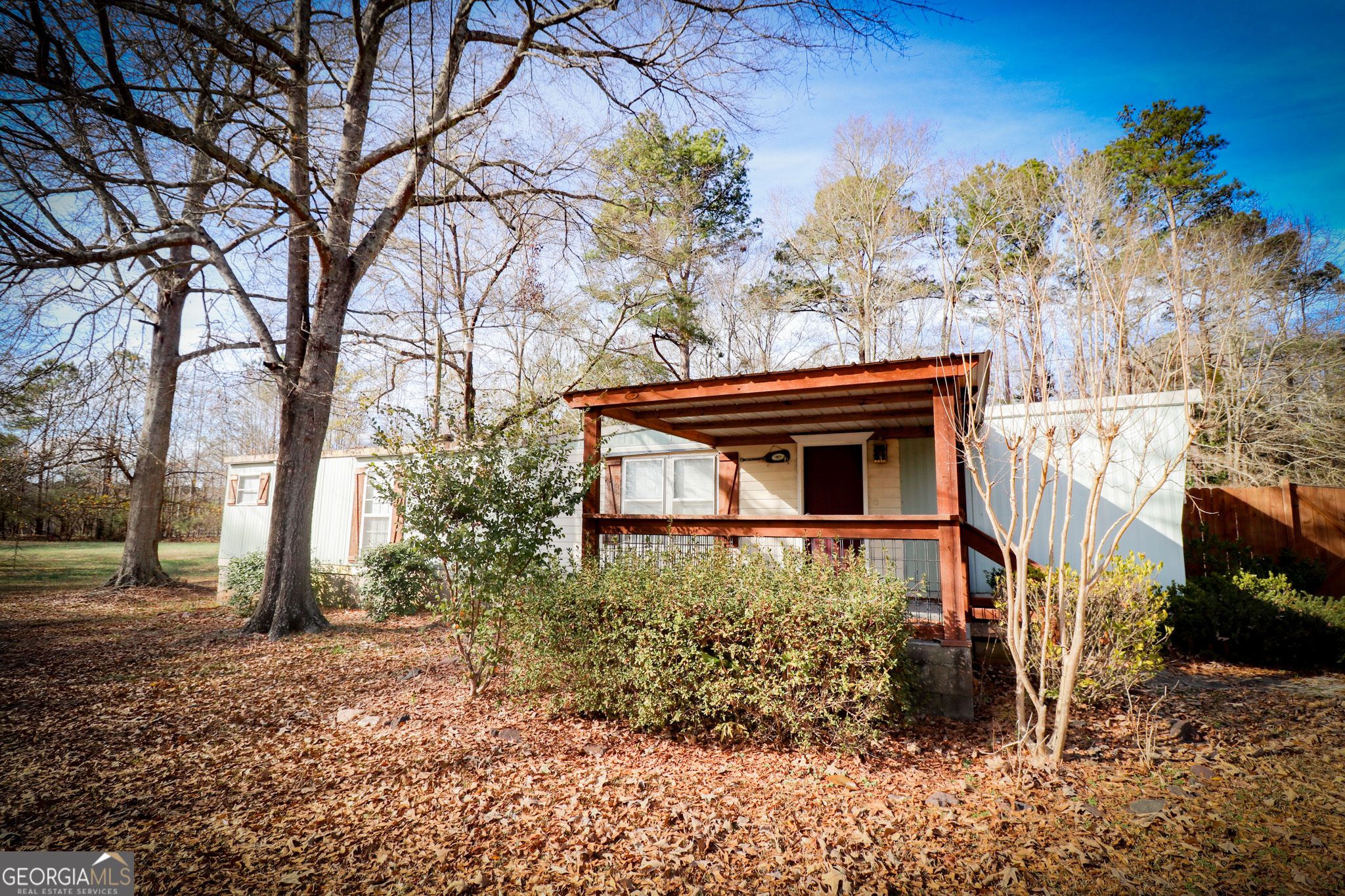 2447 Williamson Road Williamson, GA 30292 - Photo 4 of 95 a backyard of a house with lots of green space