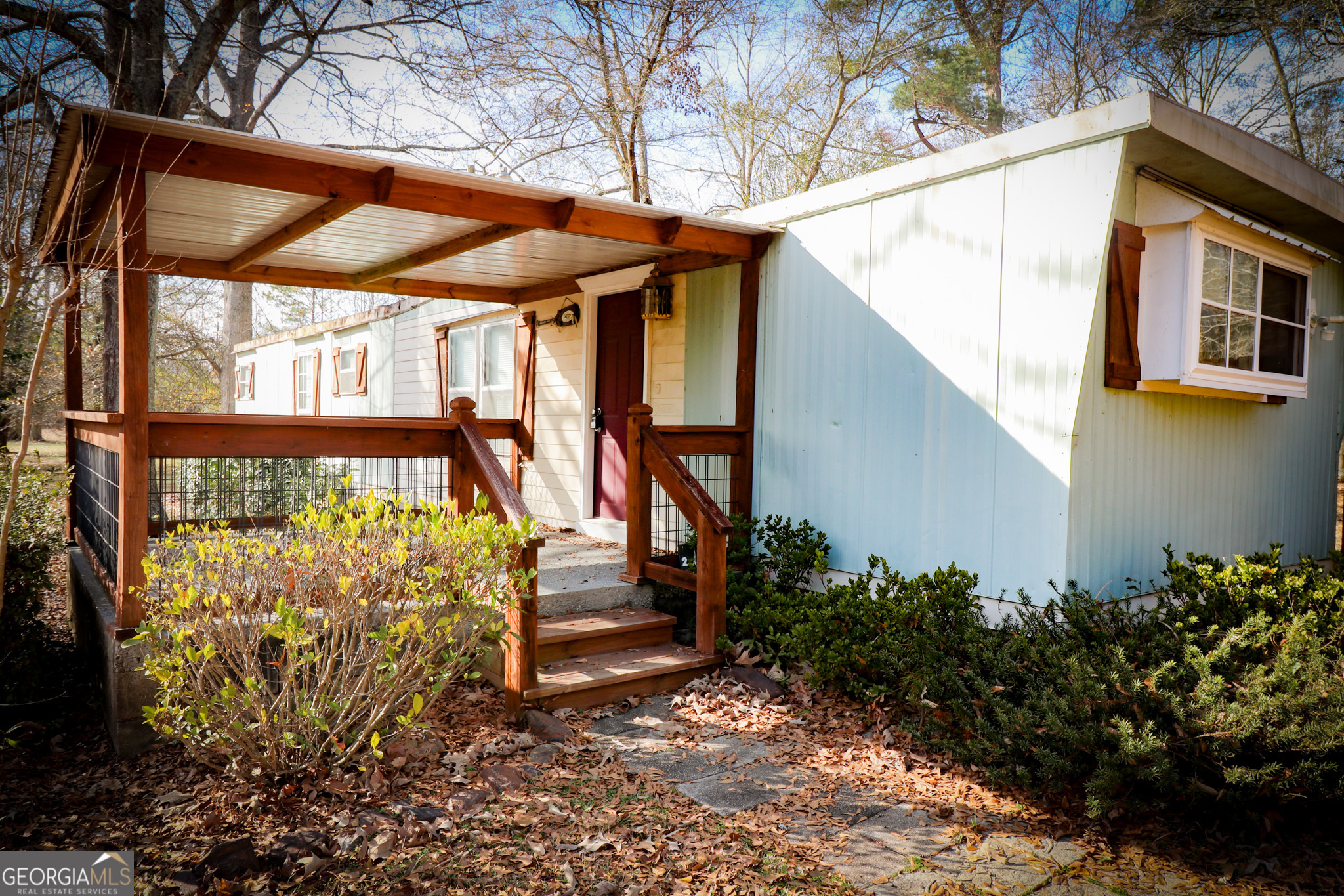 2447 Williamson Road Williamson, GA 30292 - Photo 46 of 95 a view of a porch with a yard
