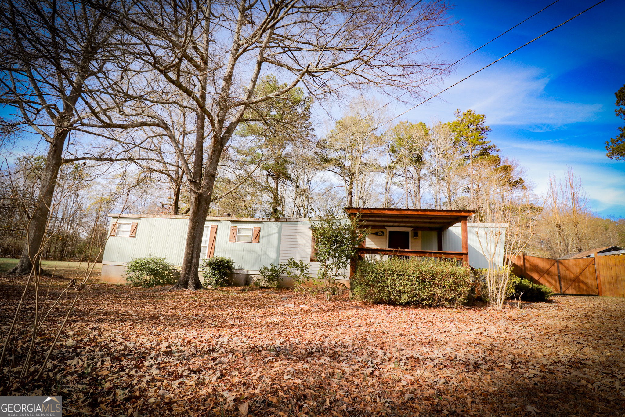 2447 Williamson Road Williamson, GA 30292 - Photo 48 of 95 a front view of a house with a yard