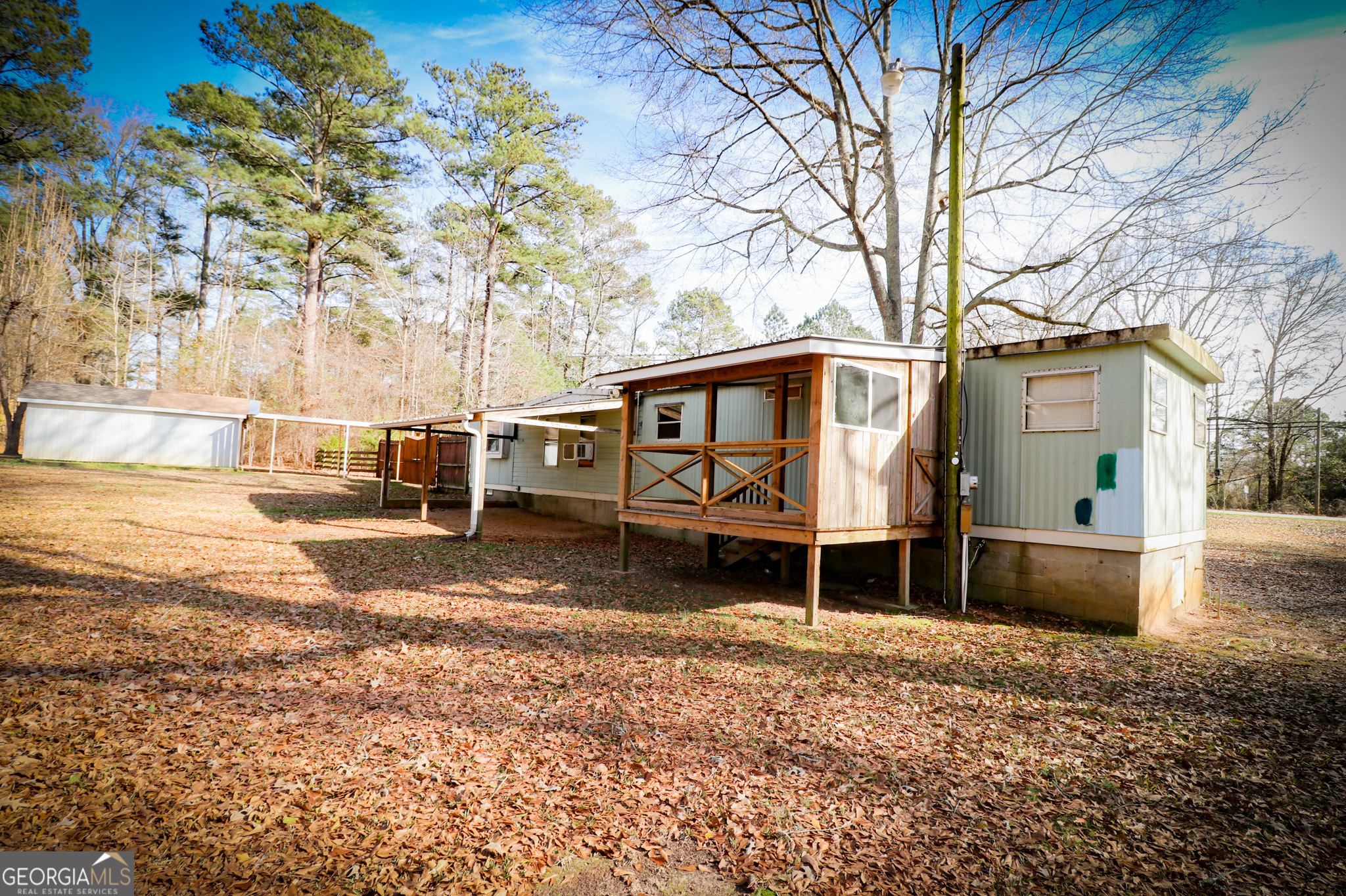 2447 Williamson Road Williamson, GA 30292 - Photo 63 of 95 a front view of a house with a yard