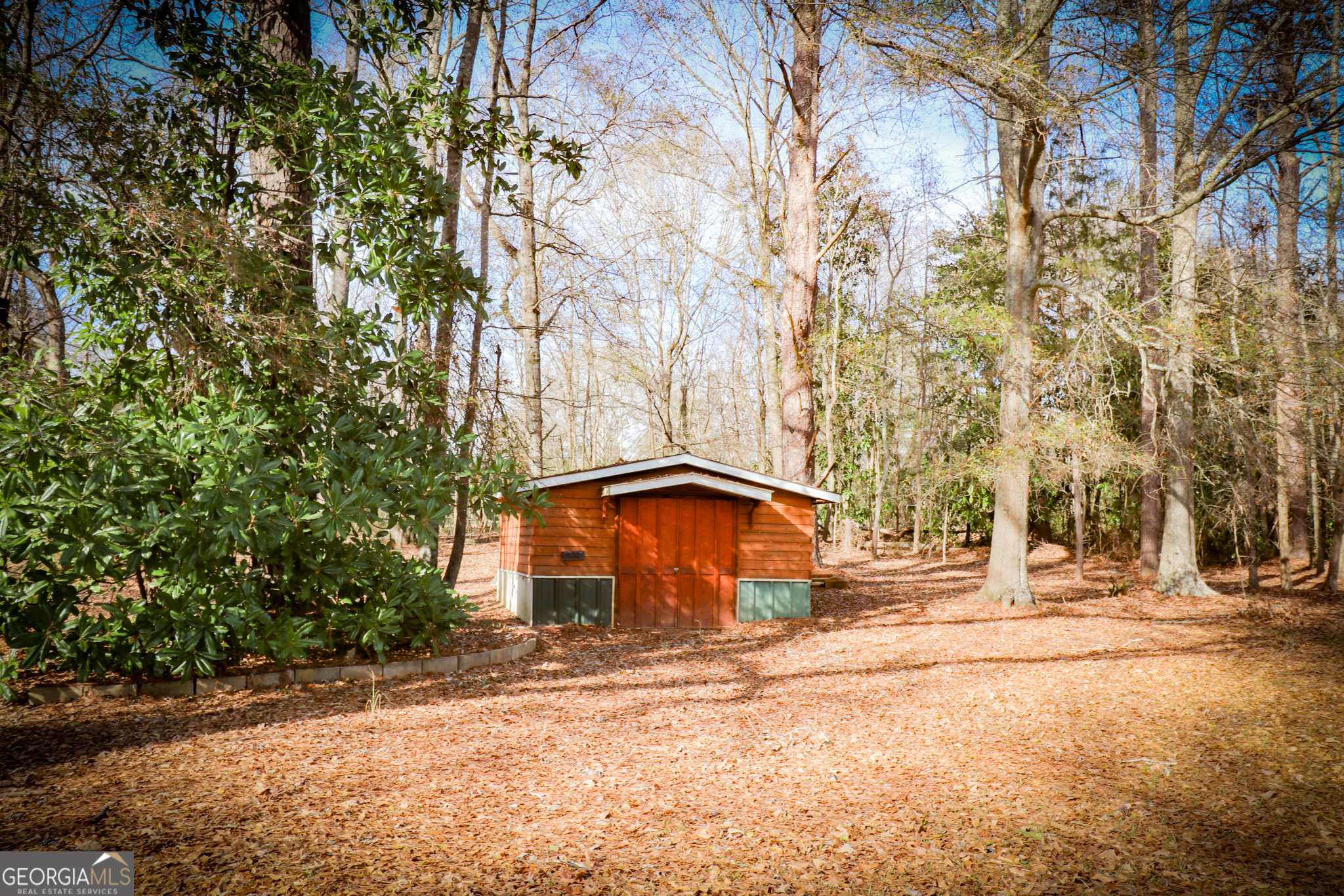 2447 Williamson Road Williamson, GA 30292 - Photo 65 of 95 a house with trees in front of it