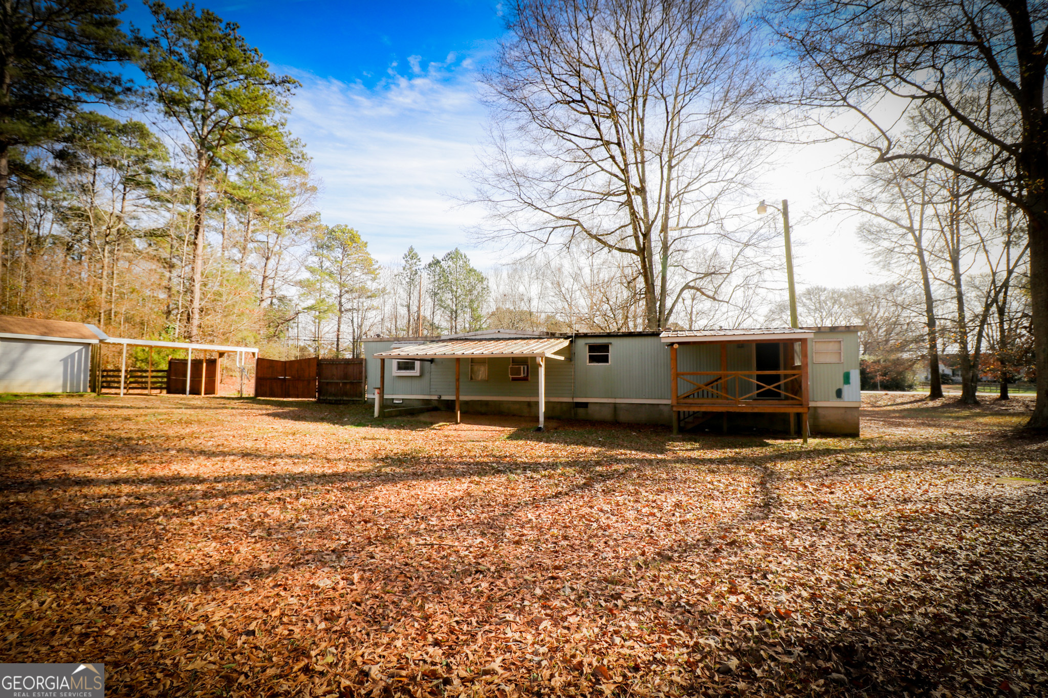 2447 Williamson Road Williamson, GA 30292 - Photo 69 of 95 a view of house with yard covered in snow