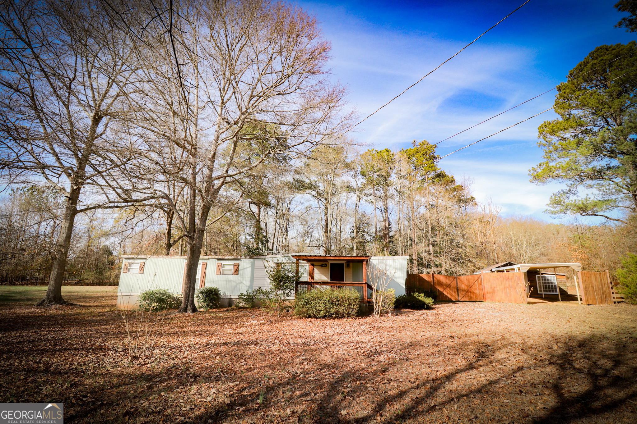 2447 Williamson Road Williamson, GA 30292 - Photo 75 of 95 a view of a house with a snow in the yard