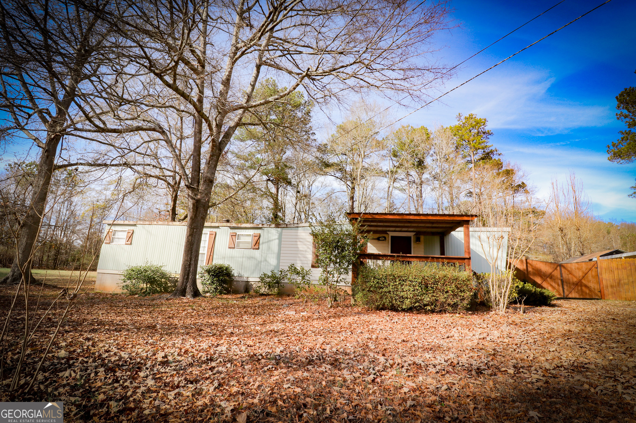 2447 Williamson Road Williamson, GA 30292 - Photo 87 of 95 a front view of a house with a yard