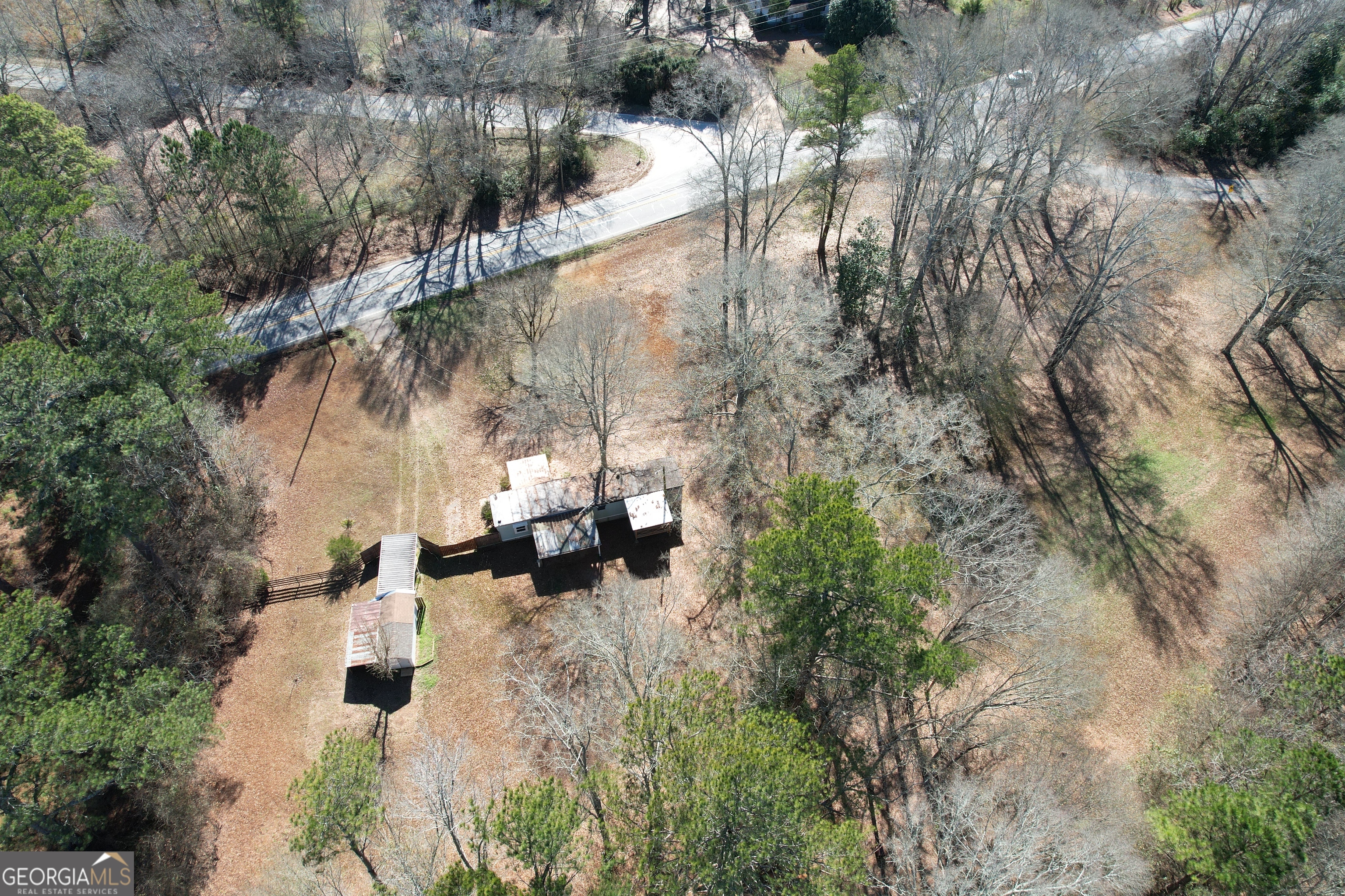 2447 Williamson Road Williamson, GA 30292 - Photo 94 of 95 a view of a back yard with a tree