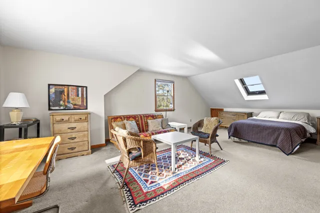 a bedroom with furniture and a couch