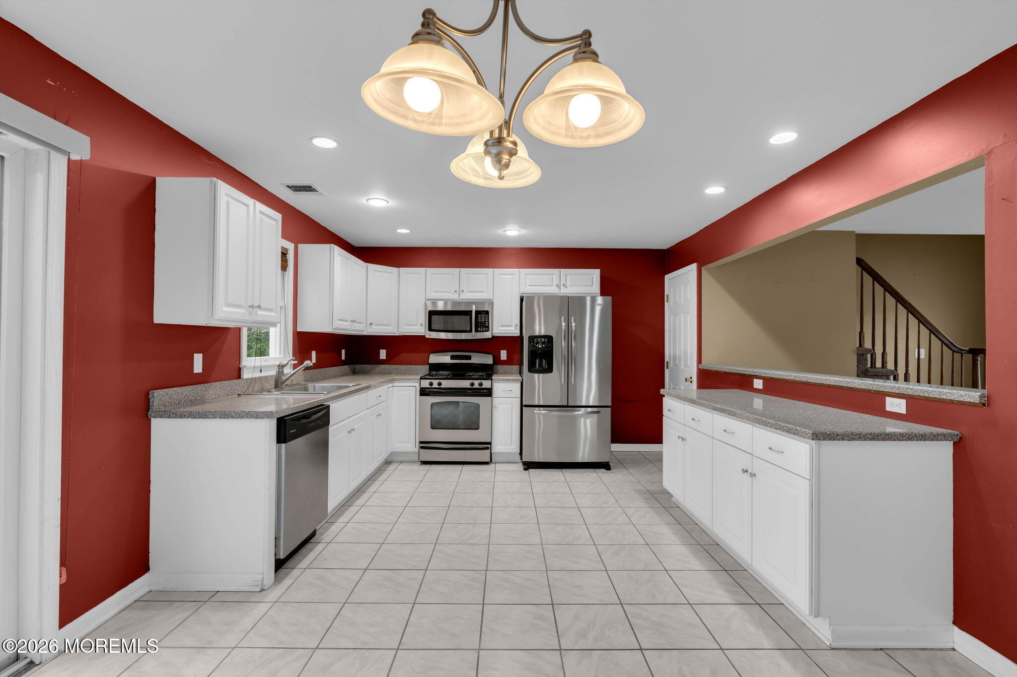 9 Forecastle Way Waretown, NJ 08758 - Photo 15 of 51 a kitchen with stainless steel appliances granite countertop a stove and a sink