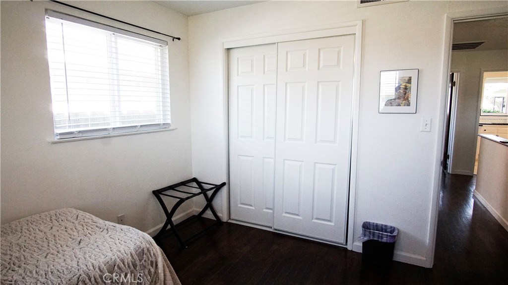 701 Williams Avenue Madera, CA 93637 - Photo 14 of 20 a bedroom with a bed and a window