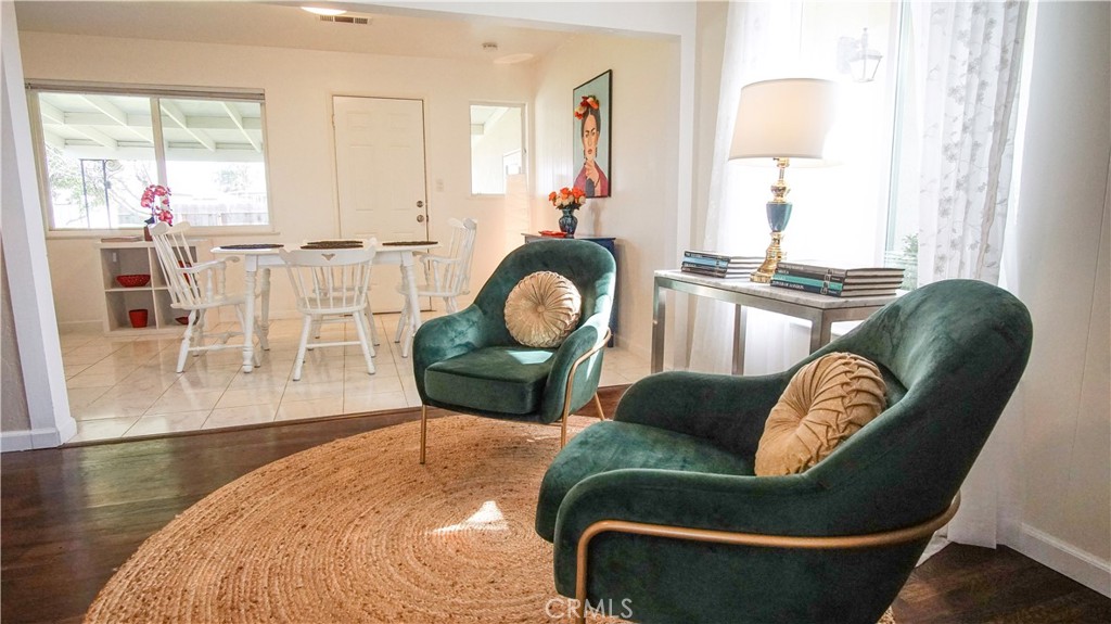 701 Williams Avenue Madera, CA 93637 - Photo 7 of 20 a living room with furniture and a large window