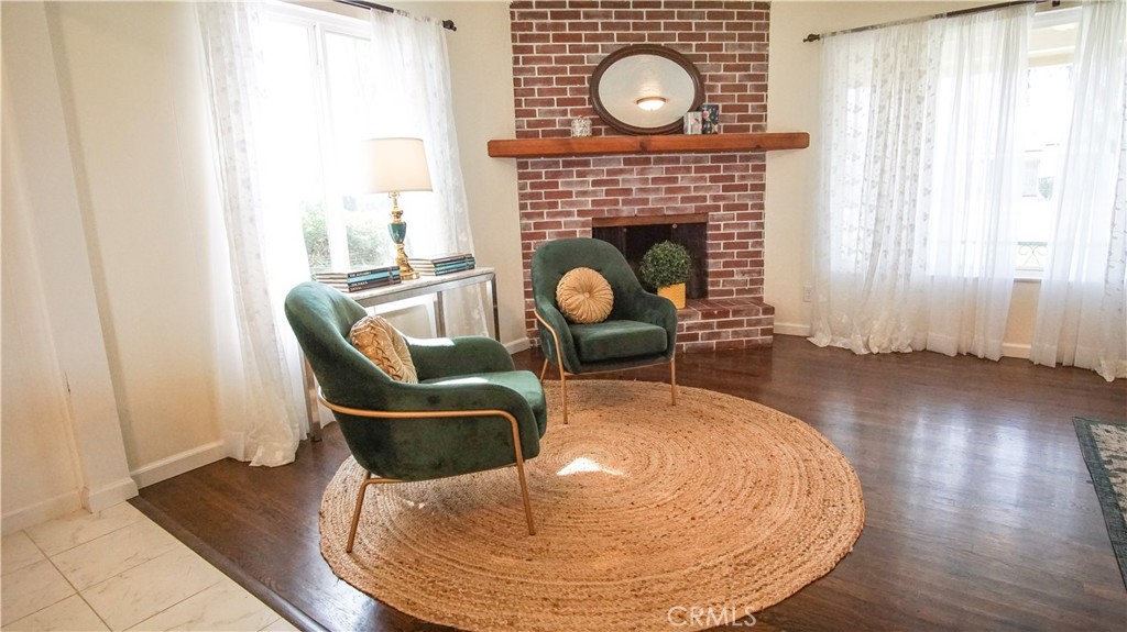 701 Williams Avenue Madera, CA 93637 - Photo 8 of 20 a living room with furniture and a fireplace