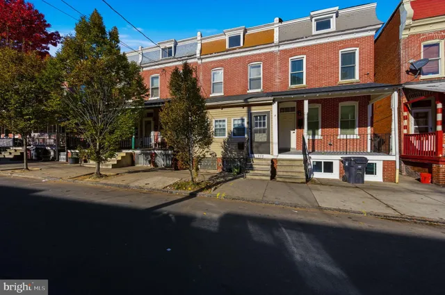 a view of a building with a street