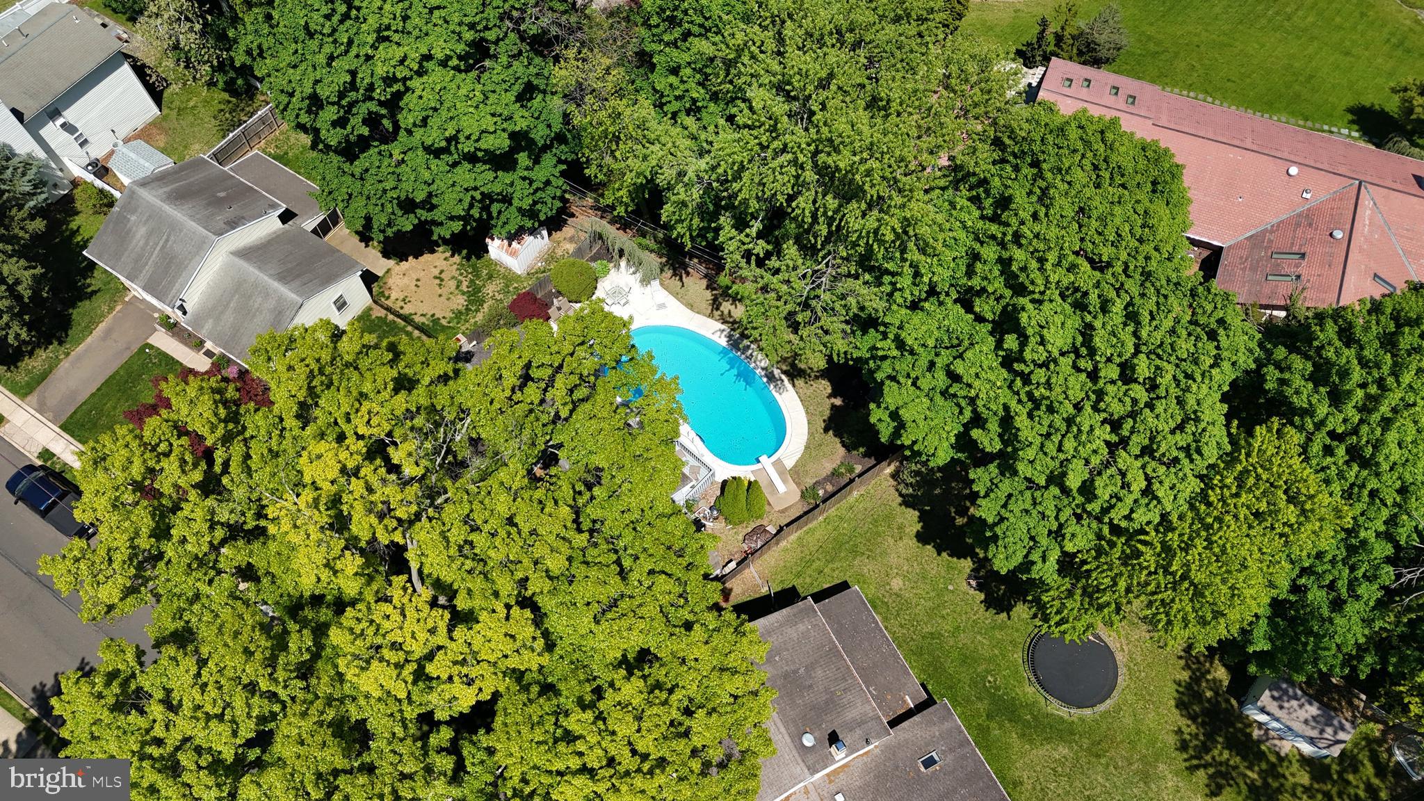 609 Mansfield Road Willow Grove, PA 19090 - Photo 56 of 68 an aerial view of a house with a yard and garden