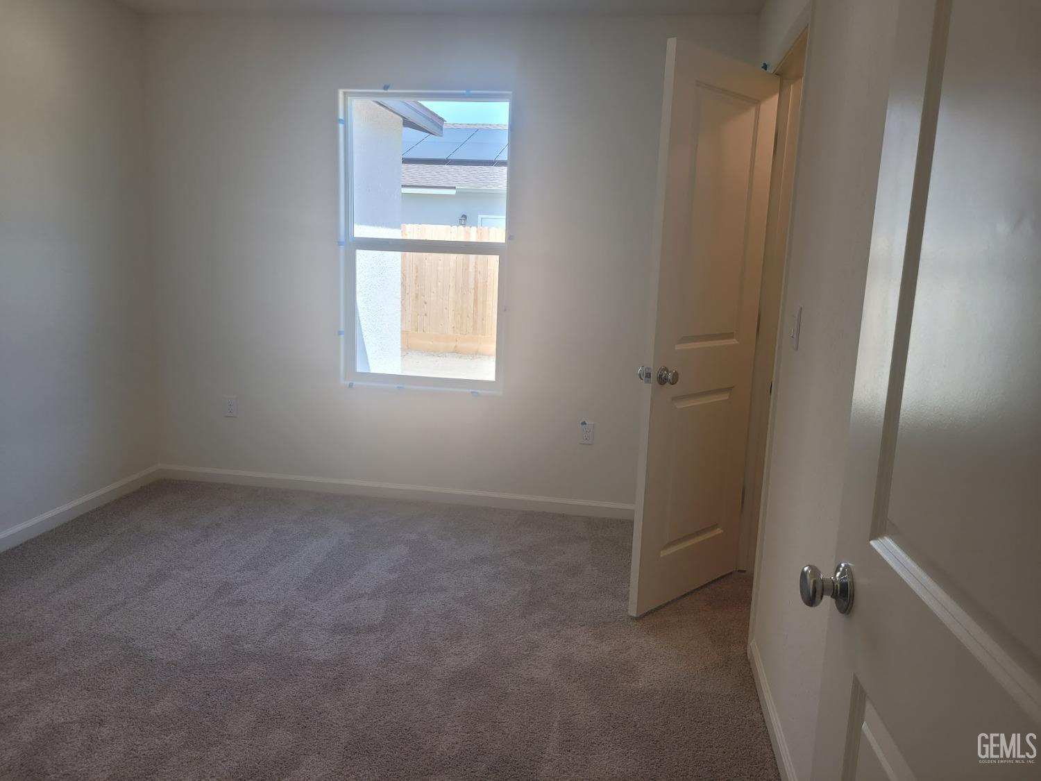 Undisclosed Address Bakersfield, CA 93307 - Photo 15 of 24 an empty room with windows and closet