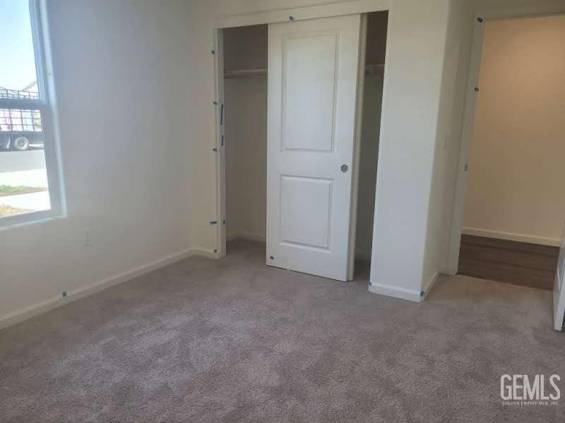 Undisclosed Address Bakersfield, CA 93307 - Photo 23 of 24 an empty room with windows