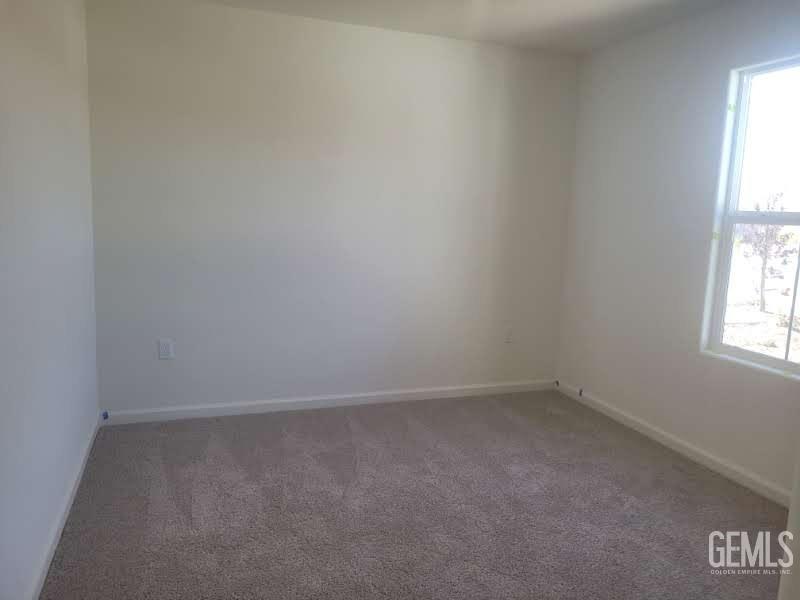 Undisclosed Address Bakersfield, CA 93307 - Photo 24 of 24 an empty room with a window