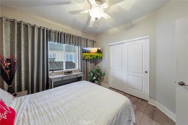 a kitchen with stainless steel appliances granite countertop white cabinets and a stove