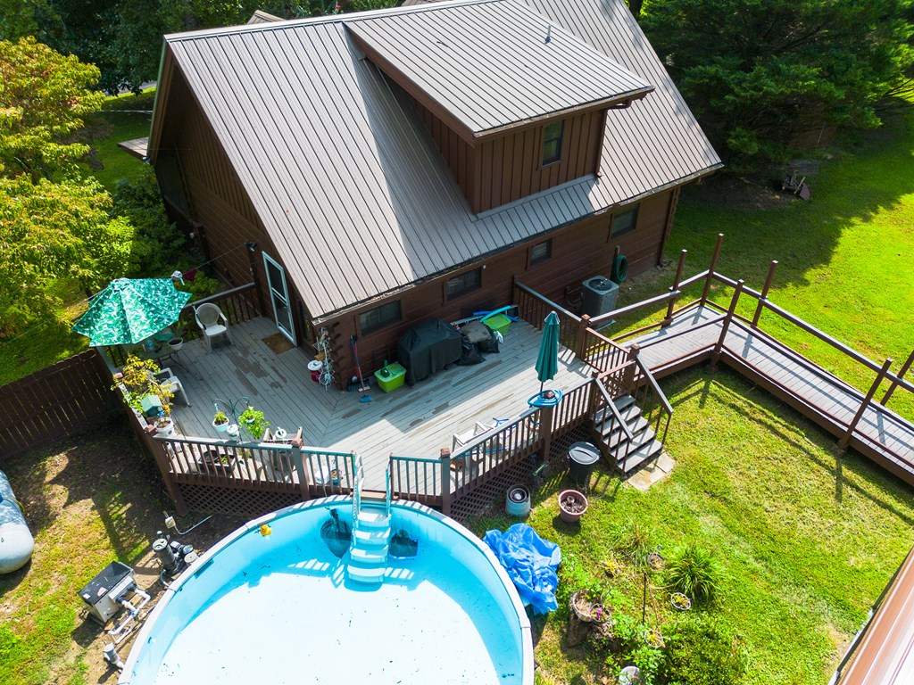 200 Lickskillet Road Epworth, GA 30541 - Photo 14 of 51 swimming pool with outdoor seating and yard