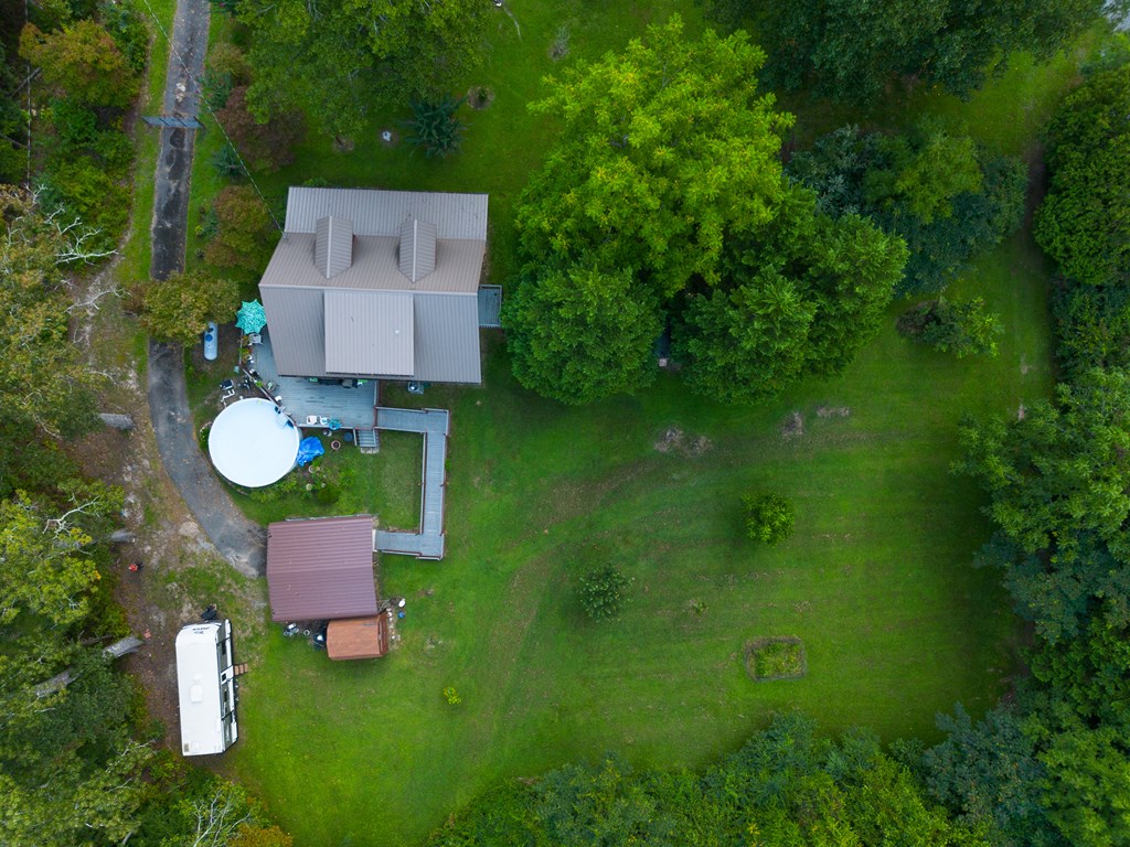 200 Lickskillet Road Epworth, GA 30541 - Photo 27 of 51 an aerial view of house with yard swimming pool and trees