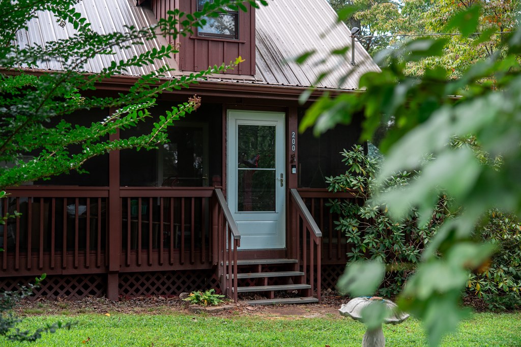 200 Lickskillet Road Epworth, GA 30541 - Photo 49 of 51 a view of a house with backyard and wooden fence