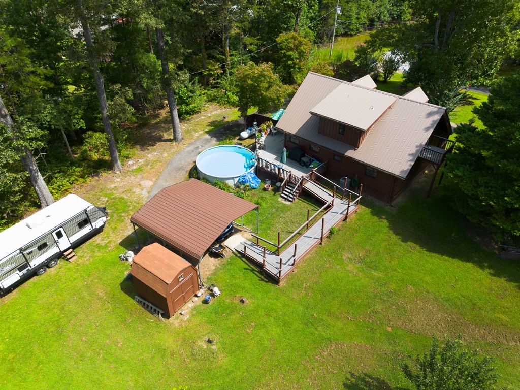 200 Lickskillet Road Epworth, GA 30541 - Photo 6 of 51 an aerial view of a house with backyard swimming pool and outdoor seating