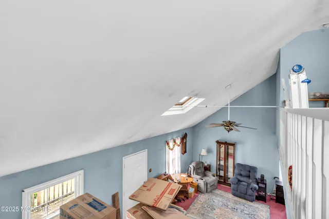 a view of a livingroom with furniture and a livingroom