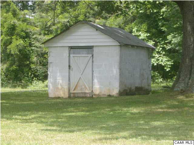 1155 Fairgrounds Road Farmville, VA 23901 - Photo 2 of 3 a front view of house with garden