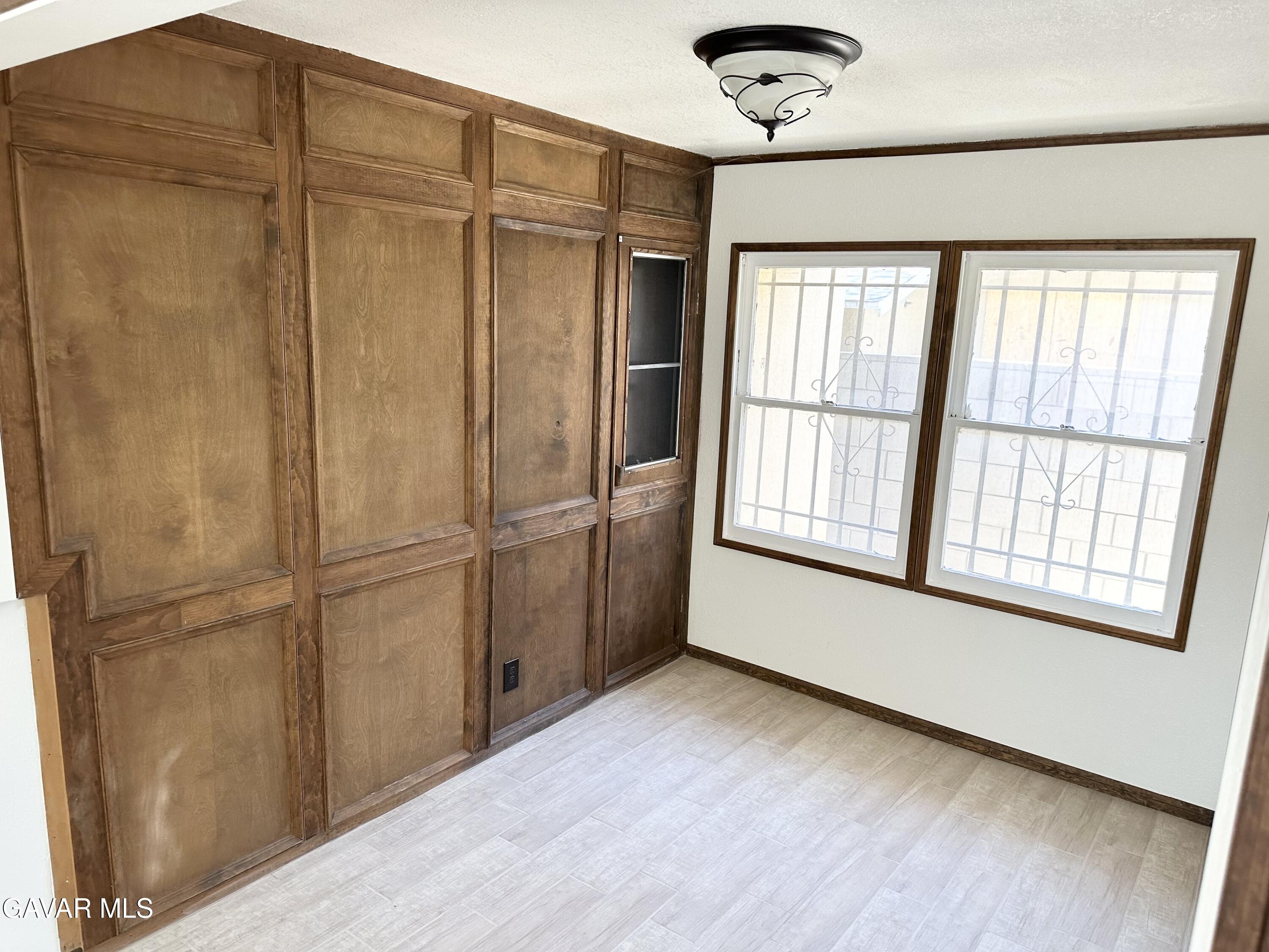 839 East Ave P-12 Palmdale, CA 93550 - Photo 4 of 9 a view of an empty room with a window