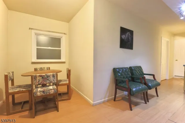 a kitchen with a sink appliances and cabinets
