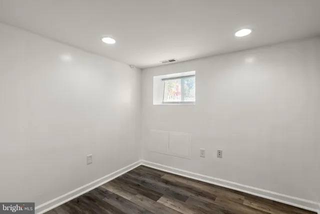 an empty room with a workbench